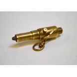 A Victorian novelty brass propelling pencil fob in the form of a cannon, in the manner of