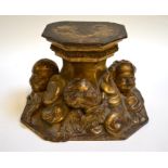 A large Italian 19th century carved wood and gilt gesso plinth or stand, carved with cherubs amongst