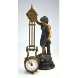 A continental base-metal figural mystery clock, for restoration