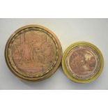 Two French lacquered brass circular dresser-top boxes, the covers with engraved pictorial copper