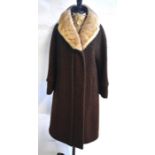 A brown wool bouclé coat retailed by Berys, Bournemouth with cream mink collar, 56 cm across chest