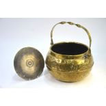 A brass cauldron with loop handle, 32 cm to/w a Negretti & Zambra brass barometer dial, 21 cm diam