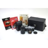 An Asahi Pentax SL camera no. 3079603 with super-Takumar 1:2/55 lens no. 4678812, in case with