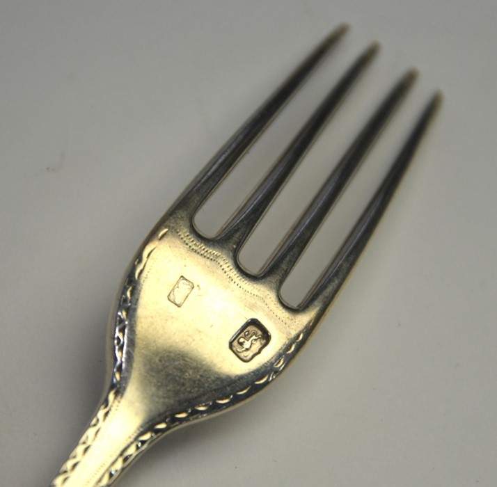 A set of six George III silver bright-cut table forks, assay and maker's marks only, probably George - Image 2 of 3
