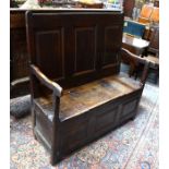 A late 17th/18th century joint oak box settle with shaped arms - alterations/repairs, 114 cm w x