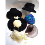 A Peter Burley black and cream lady's felt fat, two other black felt hats, a turban-style