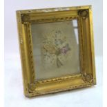 A 19th century silk longstitch bouquet of flowers, in glazed gilt frame, 25 x 22 cm, a/f