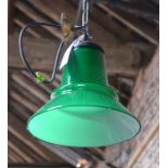 A contemporary green glass hinging light fitting, 24 cm dia. x 22 cm h