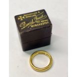 A 22ct yellow gold wedding band, size K, approx 6.4g