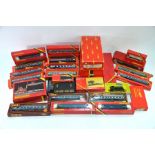 A quantity of boxed Hornby 00 gauge models - 4 locomotives, 11 carriages and other rolling stock,