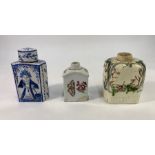 An early 19th century English creamware tea caddy of rectangular rounded form moulded with a