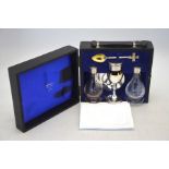 A silver parcel gilt travelling Holy Communion set, comprising:  chalice, paten, pyx (wafer box) and