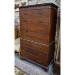 A George III mahogany chest on chest, the dentil moulded cornice over two short and six long