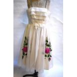 A bespoke 1950s ivory white georgette cocktail dress with diamanté shoulder straps and green velvet,