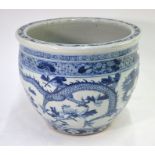 A Chinese blue and white fish bowl, decorated on the exterior with a bold design of dragons and