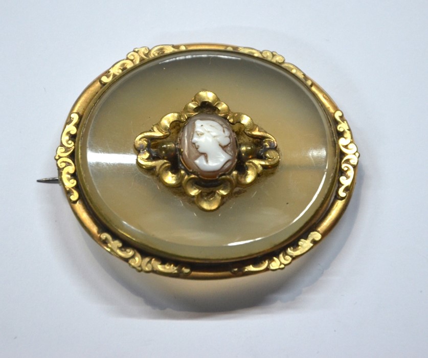 A large Victorain oval chalcedony brooch with gilt metal scroll mount and small oval cameo and - Image 3 of 5