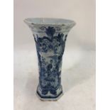 A Dutch Delft blue and white tall octagonal flaring vase painted with a Japanese geisha in a