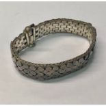 A French white metal bracelet with rectangular and circular decoration, stamped 925
