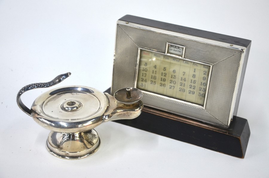 A silver 'Aladdin's lamp' table cigarette lighter, with snake handle, Birmingham 1921 to/w a