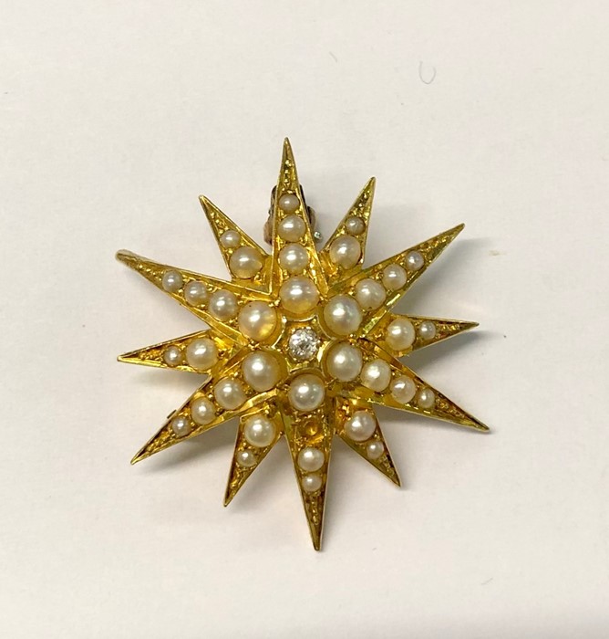 A 19th century 18ct yellow gold star burst pendant set overall with pearls, the centre with single - Image 2 of 4