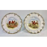 Two Royal Crown Derby fluted cabinet plates painted to the centre with hunters and hounds by J.
