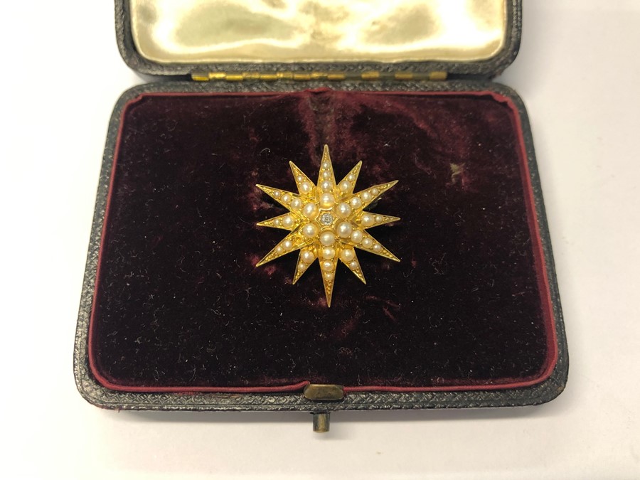 A 19th century 18ct yellow gold star burst pendant set overall with pearls, the centre with single - Image 4 of 4