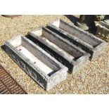 Three composite cast rectangular planters