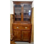 A 19th century mahogany secretaire bookcase with astragal glazed doors enclosing adjustable