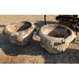 A pair of very weathered garden urn planters (2)