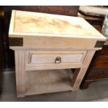 A beech and brass mounted butchers block on stand with single drawer and fluted square supports
