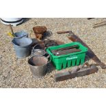 A small pig cast, iron bbq to/w galvanized buckets, watering can, metal lamp, wooden plane, saws