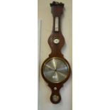 A mahogany wheel barometer