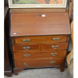 Edwardian mahogany crossbanded bureau, the fall front panel enclosing a fitted interior over a dummy