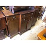 A Victorian style reproduction mahogany breakfront sideboard, raised on shaped bracket feet