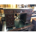 A Victorian style leather top twin pedestal desk