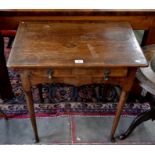 An 18th century oak side table with single frieze drawer raised on slender pad footed supports