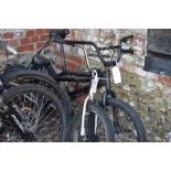 Two black BMX bikes [p19007456 p18063186]