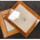 A box of various photograph frames, various sizes and styles