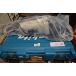 A cased Makita cordless drill set and a B & Q 240v MSAG200 angle grinder (2)