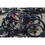 A Cannondale Trail 7 hardtail mountain bike (missing front wheel) to/w four other various bikes