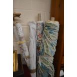 Four rolls of floral and green/blue velvet curtain fabric to include Sanderson etc.