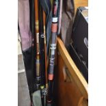 A bundle of fishing rods to include Shakespeare, Daiwa, a collection of fly tying equipment,