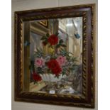 A floral painted and etched glass mirror in decorative wooden frame