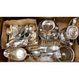 A box of silver plated wares including soup ladles and flatware, gravy boat, bottle coaster, hot