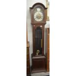 A mahogany longcase clock the brass dial with silvered chapter ring and roman numerals, glazed case