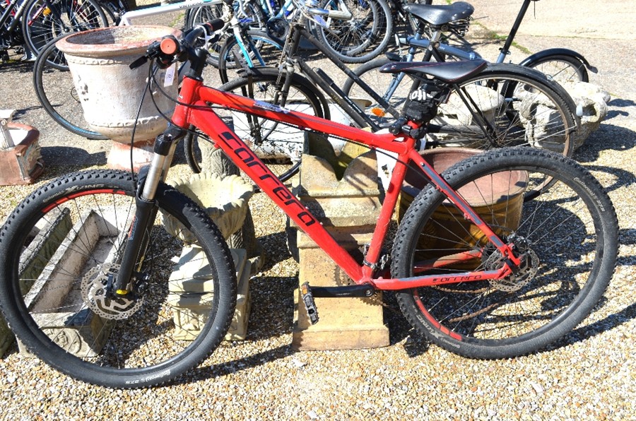 A Carrera Kraken hardtail mountain bike with red frame [bp5]