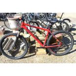 A Carrera Kraken hardtail mountain bike with red frame [bp5]