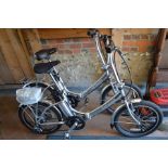 Two 'AS BIKES' Electrobikes with folding silver frames and rear pannier racks c/w batteries, keys