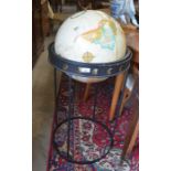 A Replogle 16 inch dia. globe on wrought metal stand