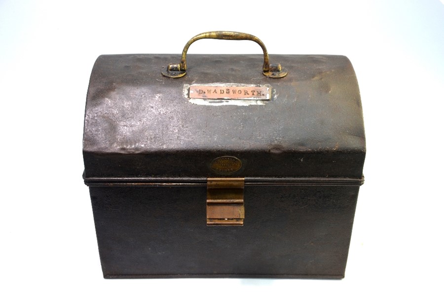 A Victorian small domed tin box with brass mounts, by J W Dobson of Grimsby, 34 cm wide